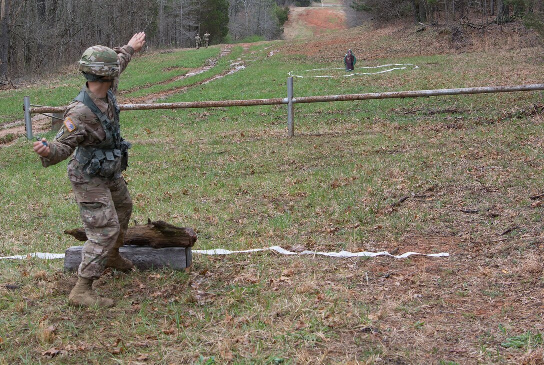 Sgt. 1st Class Eric Ojeda, from the 94th Training Division, throws a hand grenade as part of the 80th Training Command's 2018 Best Warrior Competition at Fort Knox, Kentucky, April 14, 2018. (U.S. Army Reserve photo by Maj. Addie Leonhardt, 80th Training Command)