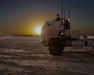 Soldiers with a 1st Battalion, 14th Field Artillery high mobility artillery rocket system (HIMARS) wait until the sun sets before executing live-fire training missions during Operation Saif Strike in the United Arab Emirates (UAE) on March 22, 2018.