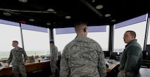 Air traffic controllers assigned to the 100th Operations Support Squadron prepare for an incoming flight at RAF Mildenhall, England, April 9, 2018. Air traffic controllers are responsible for more than just the tower; they are also charged with maintaining the ground controllers, flight data, base operations and the radar facility. All are integral pieces of the puzzle that keep Team Mildenhall refueling the fight and powering the mission. (U.S. Air Force photo by Airman 1st Class Alexandria Lee)