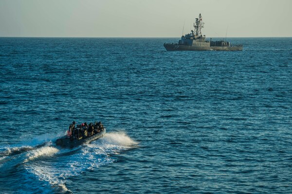 A small US Navy boat maneuvers in the Pacific.