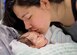 Ashley Mockovciak, Team Shaw spouse, kisses her son Noah Mockovciak in a hospital at Charleston, S.C., circa February 2017.