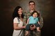U.S. Air Force Tech. Sgt. Ben Mockovciak, 372nd Training Squadron Detachment 202 F-16 tactical aircraft maintenance instructor, right, and Ashley Mockovciak, Team Shaw spouse, left, stand with their son, Noah Mockovciak, at Shaw Air Force Base, S.C., April 24, 2018.