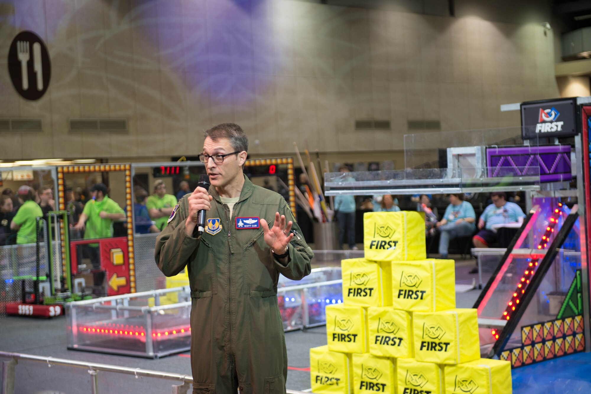 U.S. Air Force Col. Scott A. Cain, Arnold Engineering Development Complex commander, gives the opening speech at the 2018 FIRST® Robotics Competition Rocket City Regional at the Von Braun Center in Huntsville, Alabama, March 17, 2018. Cain motivates the competitors with an inspirational account of how his love of Science, Technology, Engineering and Mathematics drew him to the U.S. Air Force and how those fundamentals allowed him to succeed in the U.S. Air Force Academy, U.S. Air Force Flight and Test Pilot Schools, and his current assignment as the AEDC commander. (U.S. Air Force photo/Christopher Warner)