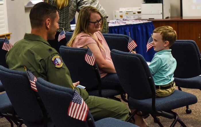 Lt. Col. David Morales, left, 437th Operations Support Squadron commander, sits with Christy Jones, middle, and Brady Jones, right, during the Airman and Family Readiness Center’s “Little Heroes” ceremony April 18, 2018, at Joint Base Charleston, S.C.