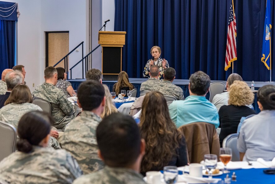 Team Dover members listen to Holocaust survivor Ann Jaffe during the Holocaust Remembrance Luncheon, April 17, 2018, at The Landings on Dover Air Force Base, Del. Jaffe spoke about her survival as a 10-year-old living in a small village in Poland and having to flee with her family to the Soviet Union. (U.S. Air Force photo by Roland Balik)