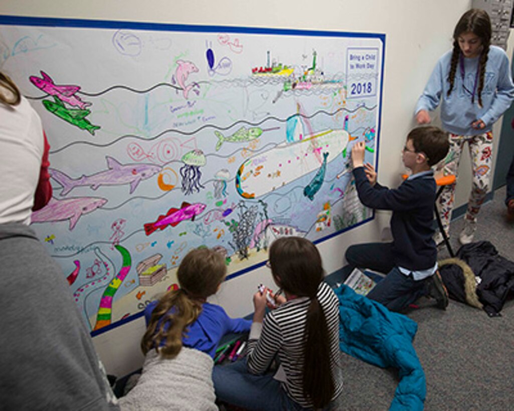 Nearly 700 children attend NUWC Newport’s Bring a Child to Work Day to learn about STEM careers, Navy traditions