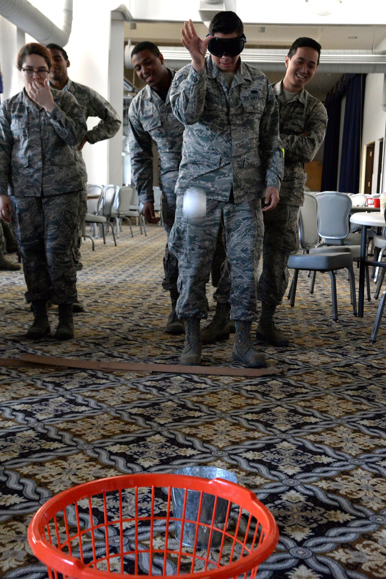 Team Dover Airmen participate in activities to show the effects of alcohol during a drinking responsibly event April 13, 2018, at the Landings on Dover Air Force Base, Del. The Airmen Committed to Excellence Council provides Airmen with opportunities to network, lead and step out of their comfort zone. (U.S. Air Force photo/Tech. Sgt. Matt Davis)