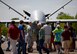 Airmen assigned to the 432nd Wing/432nd Air Expeditionary Wing from Creech Air Force Base, Nev., speak to the attendees of the 2018 Wings Over Columbus Air and Space Show about the MQ-9 Reaper and it’s capabilities April 21, 2018, at Columbus Air Force Base, Mississippi. This was the first Air Force event the MQ-9 and its aircrew attended during the 2018 season and marked the first time the aircraft was at Columbus Air Force Base. (U.S. Air Force photo by Airman 1st Class Keith Holcomb)