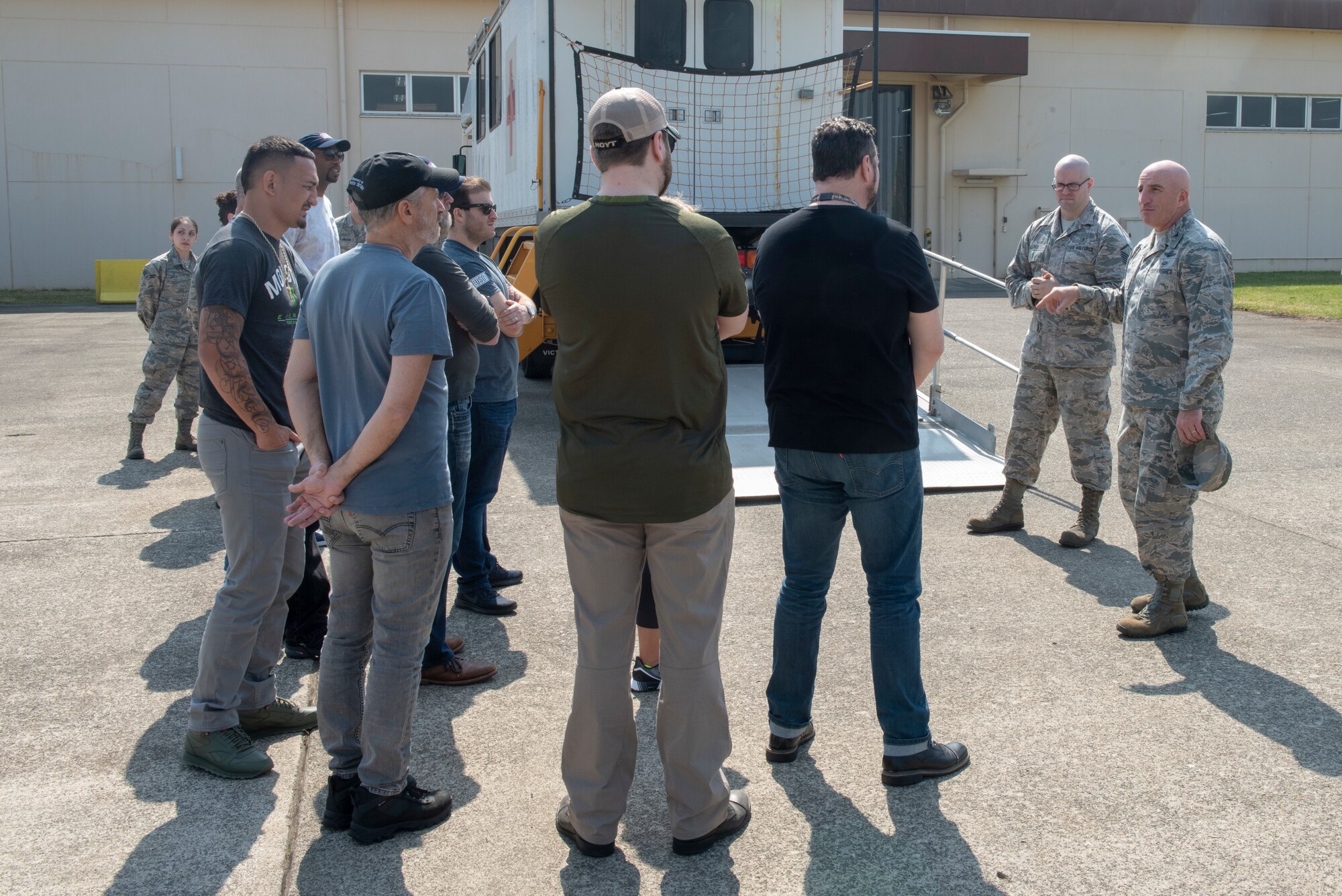 Col. Kenneth E. Moss, 374th Airlift Wing commander, takes a moment to detail the importance of the En Route Patient Staging System and the hard work the Airmen of the 374th Medical Support Squadron put forth to maintain that system to the members of the USO Spring Tour at Yokota Air Base, Japan, April 22, 2018.