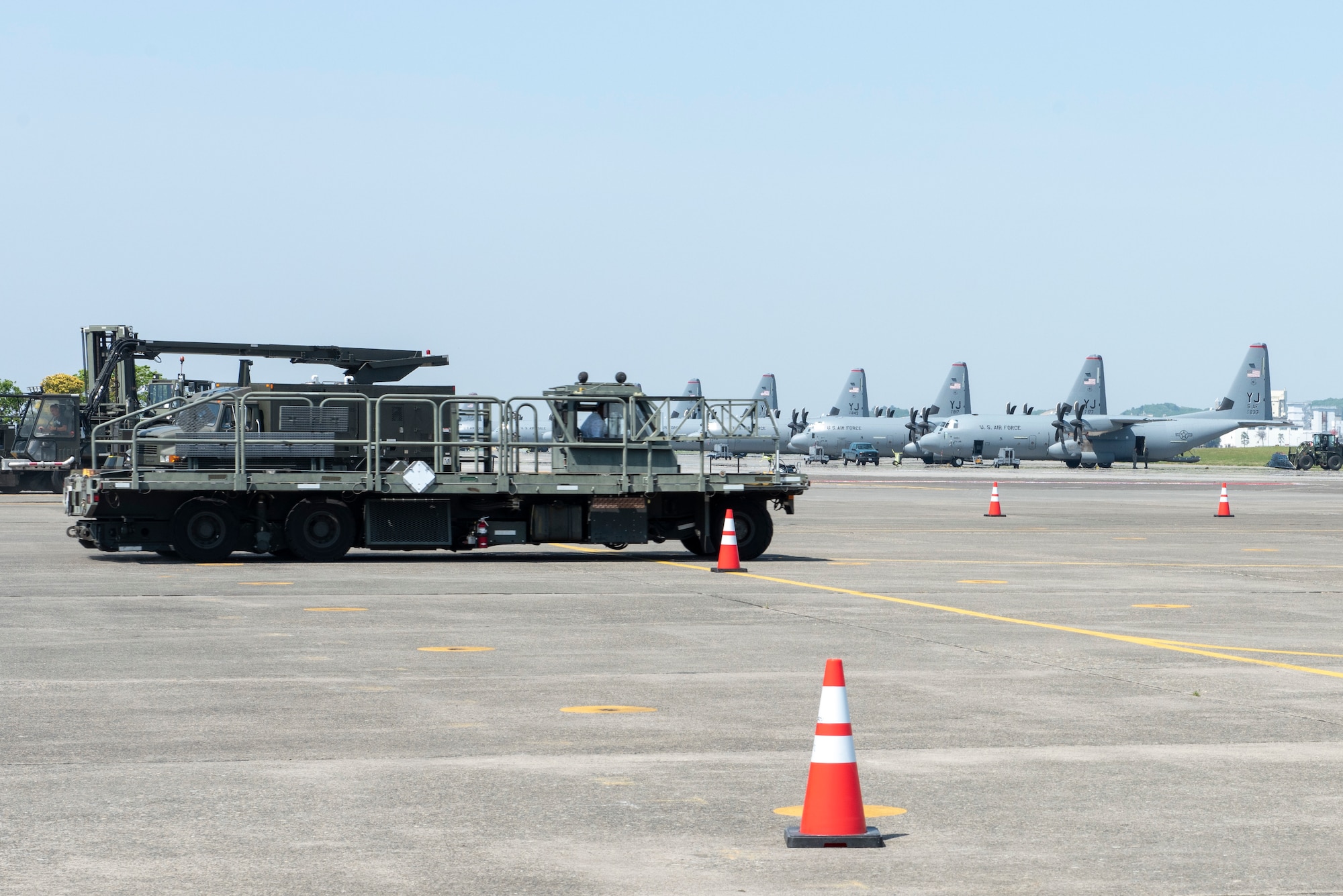 Richard “Rip” Hamilton, retired NBA player, navigates a piece of heavy equipment through sets of cones during the vehicle rodeo portion of the USO Spring Tour at Yokota Air Base, Japan, April 22, 2018.