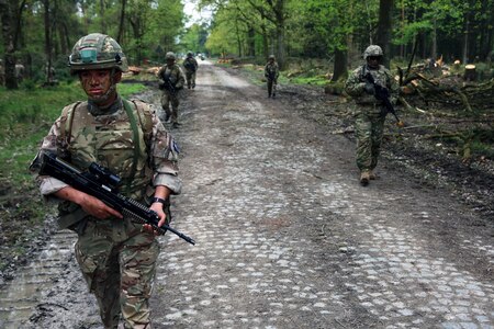 US and British Army Soldiers on patrol