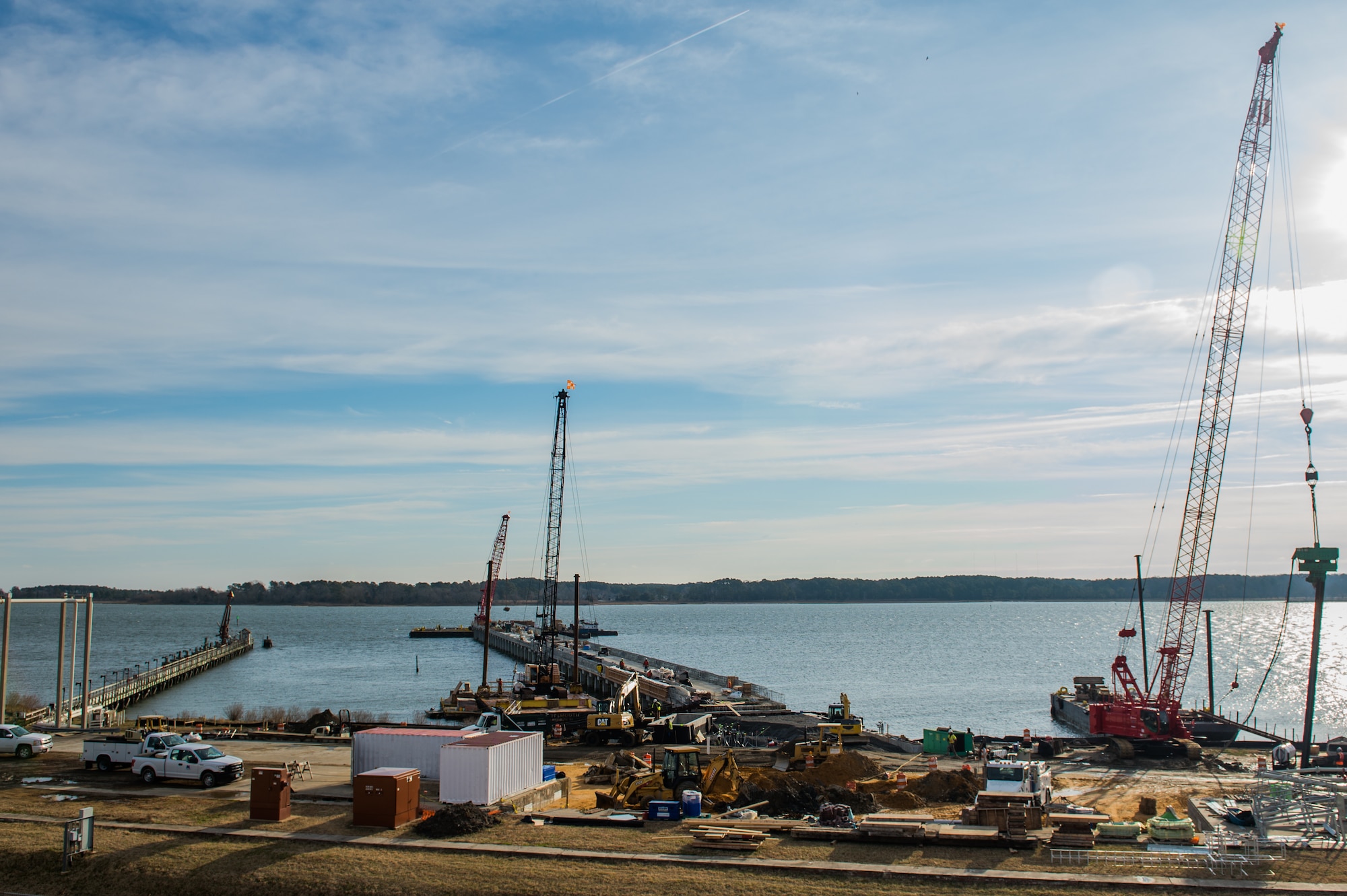 Construction of the new pier at Joint Base Langley-Eustis, Virginia, is underway, Feb. 8, 2018. The new pier, schedule for completion in early 2019, will allow first responders to be able to drive onto the peer should the need arise. (U.S. Air Force photo by Airman 1st Class Tristan Biese)