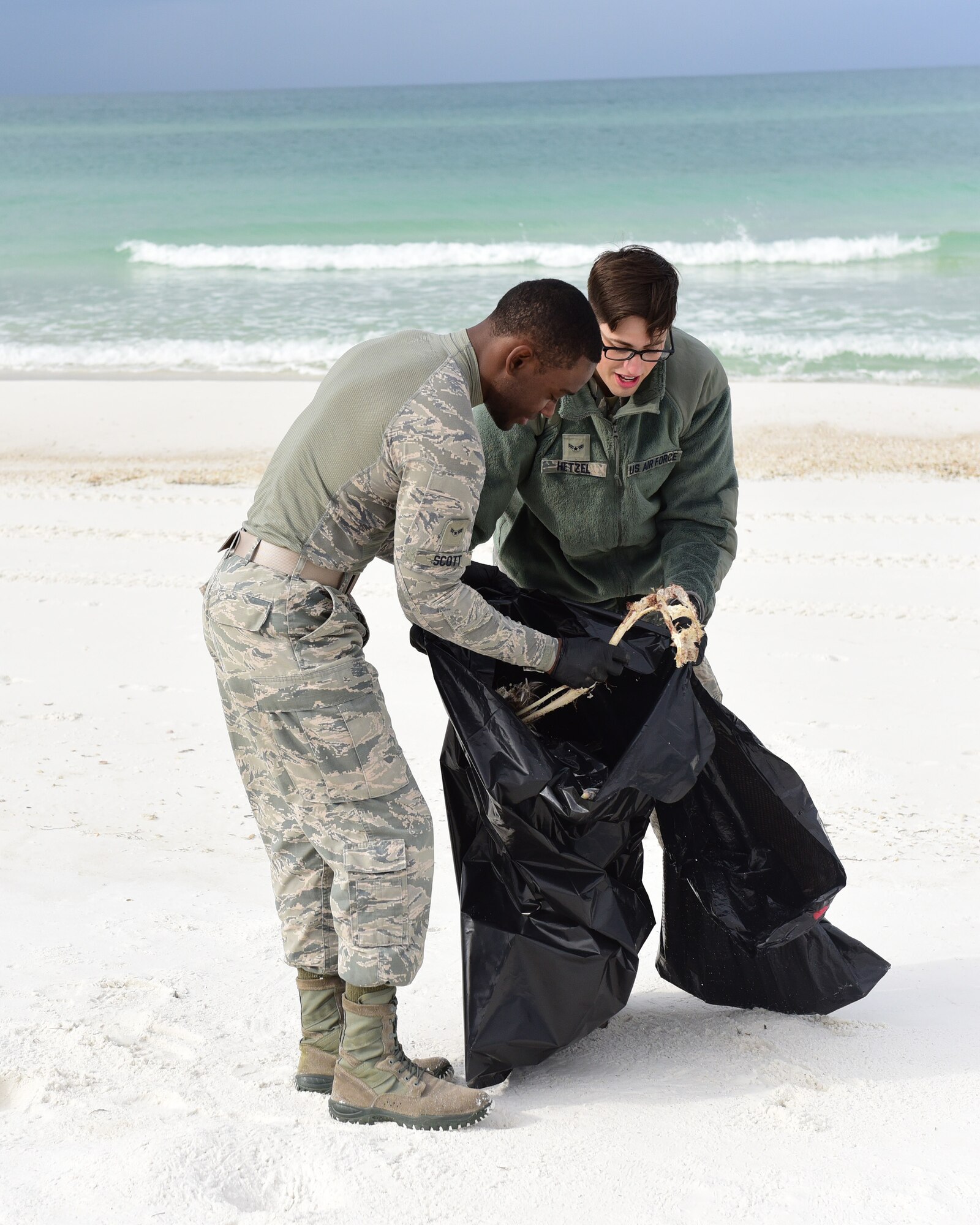 Volunteers from Tyndall Air Force Base, Fla., and the surrounding area took part in the “Tidy Up for Turtles Beach Clean-Up” at the Tyndall NCO Beach April 21, 2018. Volunteers walked the beach searching for visible debris in preparation for the upcoming sea turtle nesting season. Sea turtles and protected shorebirds often make the Tyndall NCO Beach their nesting grounds and are federally protected due to illegal harvesting, habitat encroachment and pollution. (U.S. Air Force photo by Senior Airman Cody R. Miller/Released)