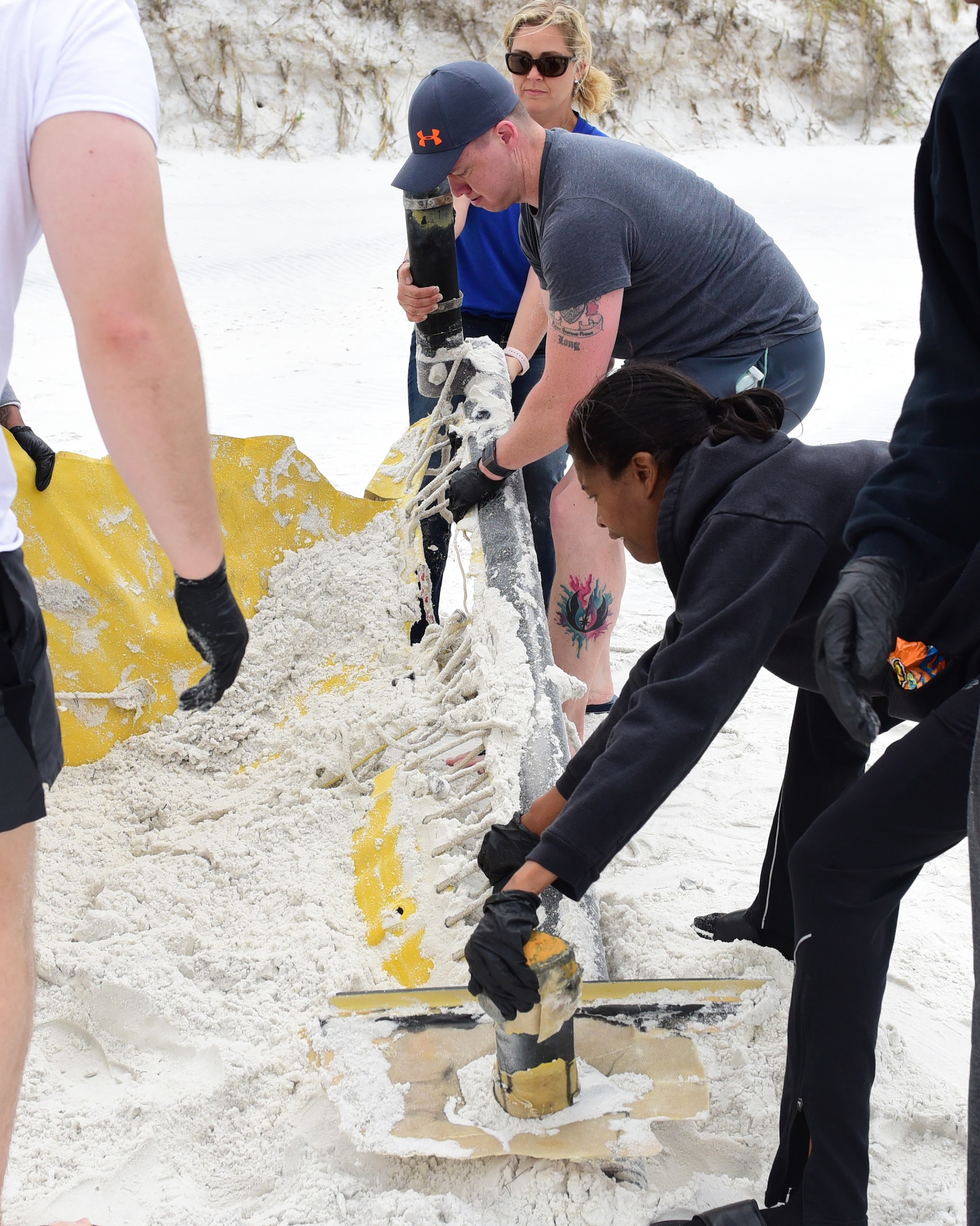 Volunteers from Tyndall Air Force Base, Fla., and the surrounding area took part in the “Tidy Up for Turtles Beach Clean-Up” at the Tyndall NCO Beach April 21, 2018. Volunteers walked the beach searching for visible debris in preparation for the upcoming sea turtle nesting season. Sea turtles and protected shorebirds often make the Tyndall NCO Beach their nesting grounds and are federally protected due to illegal harvesting, habitat encroachment and pollution. (U.S. Air Force photo by Senior Airman Cody R. Miller/Released)