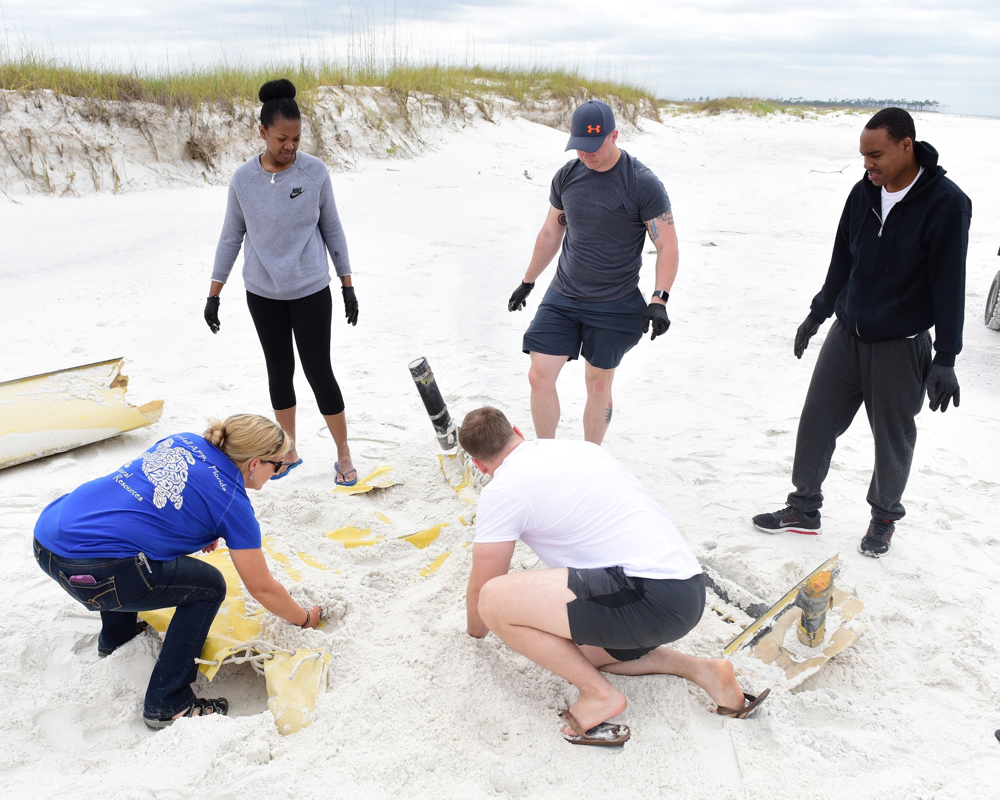 Volunteers from Tyndall Air Force Base, Fla., and the surrounding area took part in the “Tidy Up for Turtles Beach Clean-Up” at the Tyndall NCO Beach April 21, 2018. Volunteers walked the beach searching for visible debris in preparation for the upcoming sea turtle nesting season. Sea turtles and protected shorebirds often make the Tyndall NCO Beach their nesting grounds and are federally protected due to illegal harvesting, habitat encroachment and pollution. (U.S. Air Force photo by Senior Airman Cody R. Miller/Released)