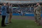 (Right) U.S. Army Col. Ralph Clayton, 733rd Mission Support Group commander, administers the oath of enlistment for three recruits at Fort Eustis Night during a Norfolk Tides game at Harbor Park, Virginia, April 21, 2018. Fort Eustis, Virginia is celebrating its 100 years and remembering the variety of missions it has supported since 1918. (U.S. Air Force photo by Senior Airman Derek Seifert)