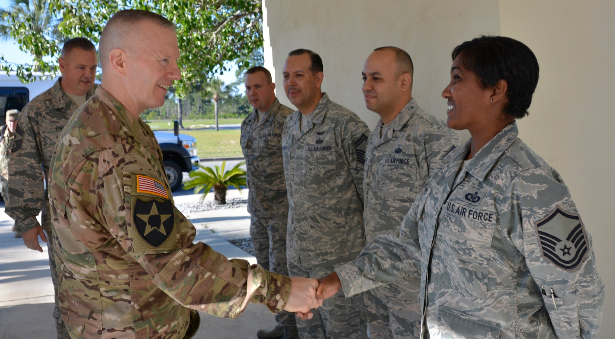 U.S. Army Command Sgt. Maj. John Wayne Troxell, Senior Enlisted Advisor to the Chairman of the Joint Chiefs of Staff and Secretary of Defense, greets Master Sgt. Erika Williams, 601st Air Operations Center Plans Division, upon arrival to an Air Forces Northern professional military development event here. Troxell was visiting as the keynote speaker for “Technical Sergeants Involved & Mentoring Enlisted Airmen,” April 24. During his remarks, Troxell, also the senior noncommissioned officer in the U.S. Armed Forces, encouraged TIME participants to develop into leaders who strive daily to set the example for subordinates by demonstrating selfless dedication to established military standards. (Air Force photo by Mary McHale)