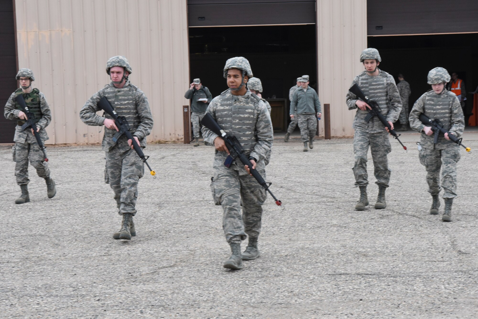 Members from the ROTC program at the University of North Dakota, participate in a readiness exercise on Grand Forks Air Force Base, N.D., April 21, 2018. The Airmen were given a task and then divided up into different teams for each station. (U.S. Air Force photo by Airman 1st Class Melody Wolff)