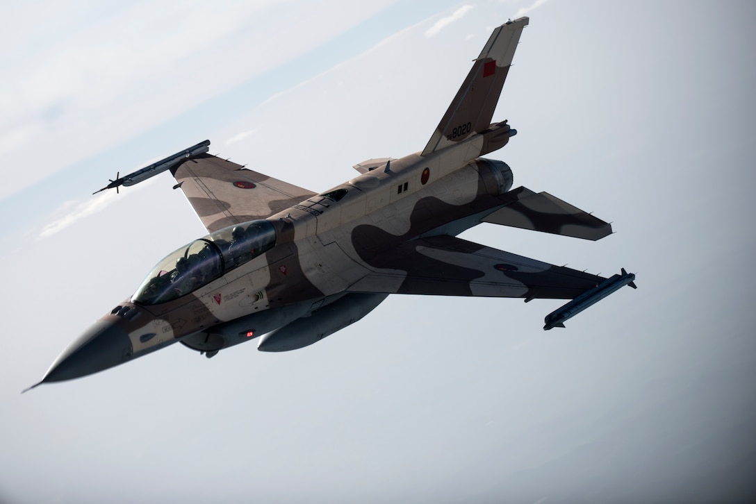 A Royal Moroccan air force F-16 flies above Morocco during Exercise African Lion April 20, 2018. Various units from the U.S. Armed Forces will conduct multilateral and stability operations training with units from the Royal Moroccan Armed Forces in the Kingdom of Morocco. This combined multilateral exercise is designed to improve interoperability and mutual understanding of each nation’s tactics, techniques and procedures while demonstrating the strong bond between the nation’s militaries. (U.S. Air Force photo/Senior Airman Malcolm Mayfield)