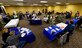 Base agencies and local vendors participate in a Permanent Change of Station Bazaar inside the Dakota’s Club at Ellsworth Air Force Base, S.D., April 19, 2018. The event brought several base agencies and local vendors together to educate Airmen and their families on the PCS process and various resources available to them. (U.S. Air Force photo by Senior Airman Randahl J. Jenson)