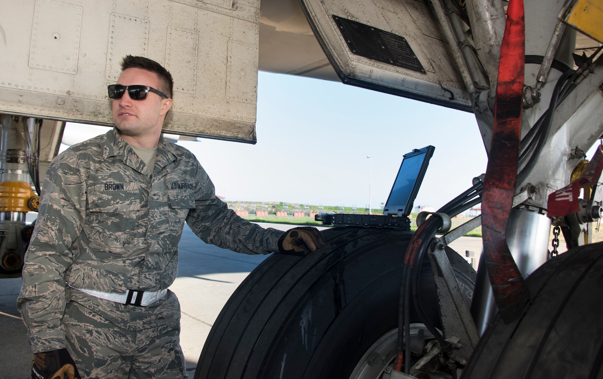 A U.S. Air Force crew chief trainee works on the front landing gear wheel well on a KC-10 Extender, Feb. 7, 2018, Travis Air Force Base, Calif. The 373rd Training Squadron, Detachment 14, based out of Sheppard Air Force Base, Texas, trains crew chiefs, electricians, jet mechanics, avionics, air and ground equipment and hydraulics troops on aircraft maintenance and repair. (U.S. Air Force Photo by Heide Couch)