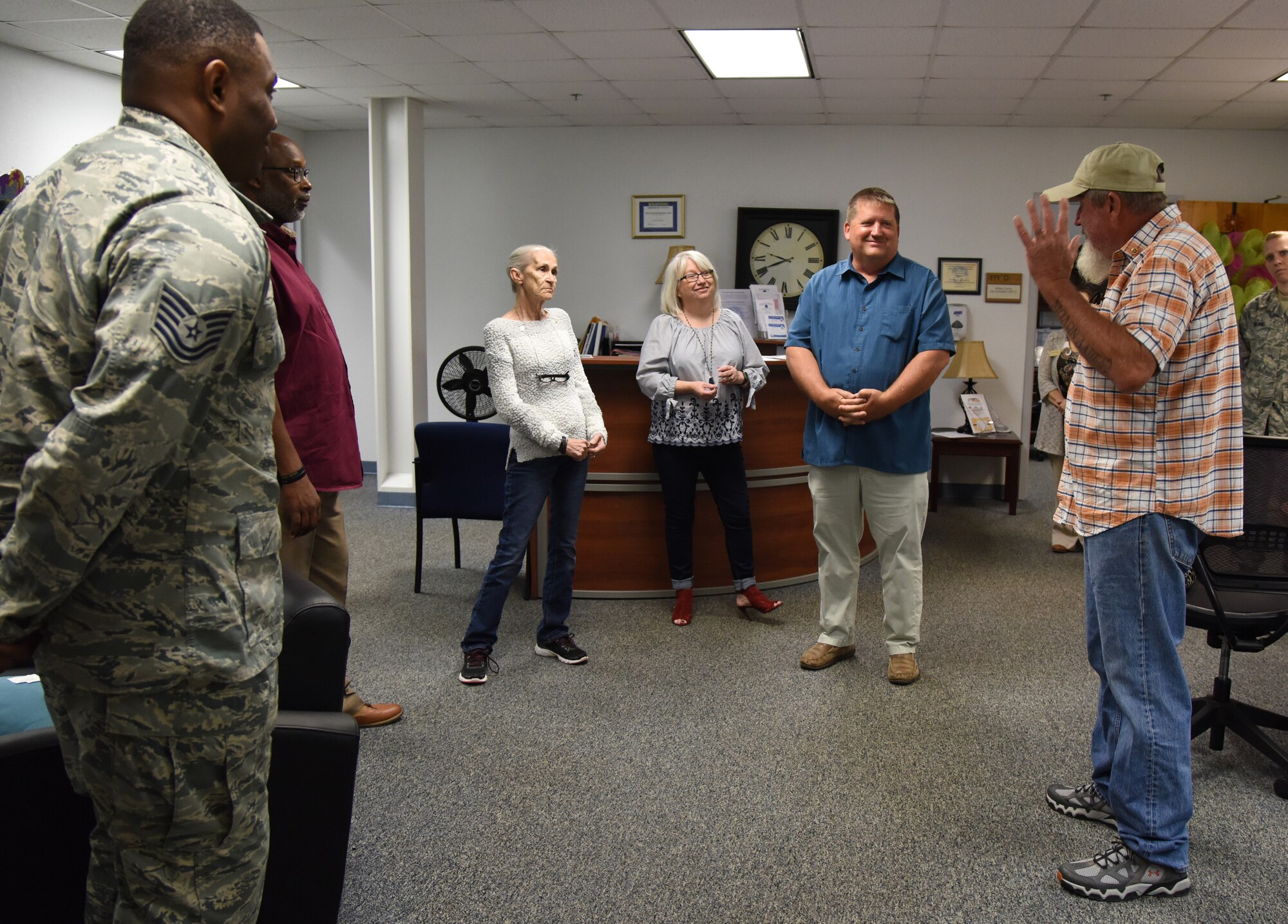 Joey Roberts, Gold Star Family Member, thanks members of the 81st Force Support Squadron Airman & Family Readiness Center at the Sablich Center at Keesler Air Force Base, Mississippi, April 24, 2018. As a surviving parent of a killed in action service member, Roberts is allowed to obtain an ID card for recognition and installation access so that he can attend events and access Airmen and Family Readiness Center referral services. (U.S. Air Force photo by Kemberly Groue)