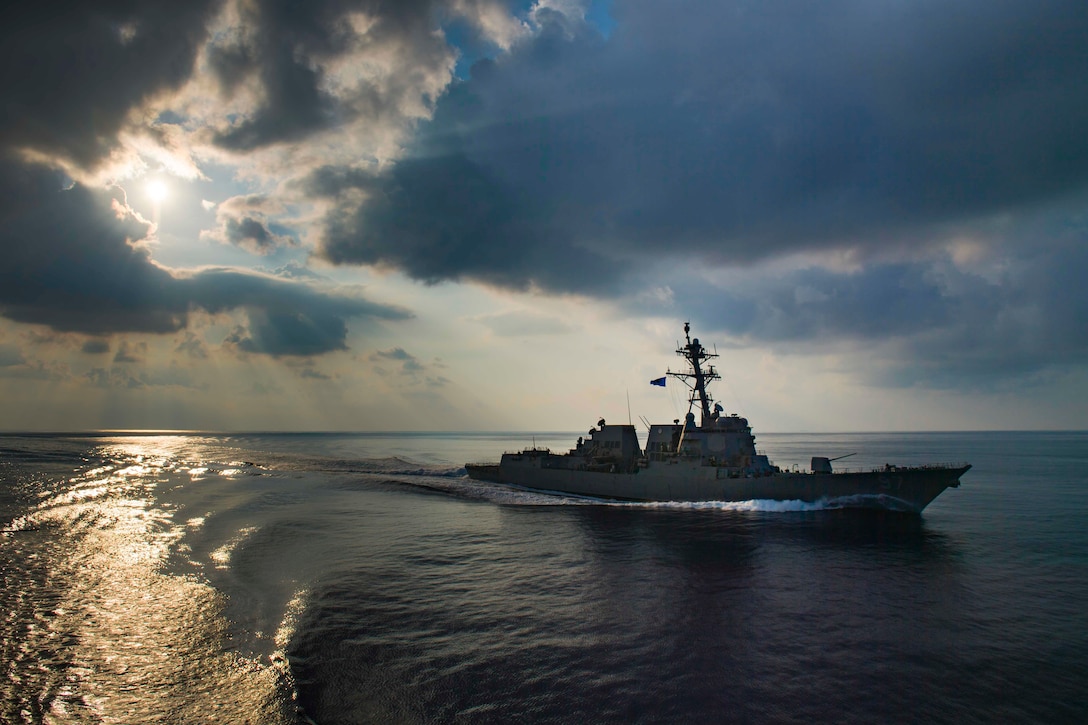 A guided-missile destroyer moves through the Indian Ocean.