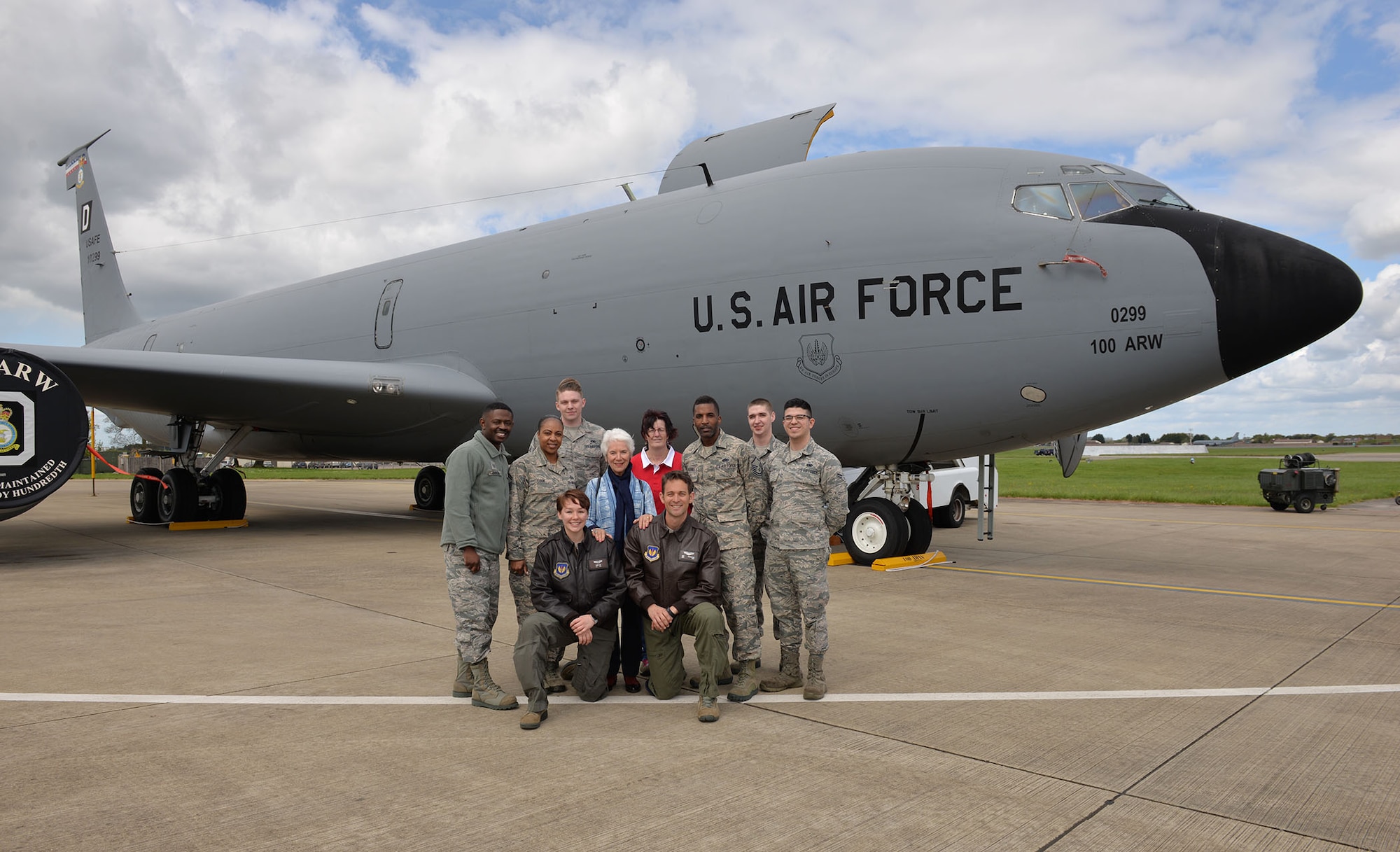 RAF Mildenhall members pose for a photo with Eva Clarke, Holocaust survivor, at a static KC-135 Stratotanker on RAF Mildenhall, England, April 26, 2018. Clarke visited the base to share her mother’s story and raise awareness about the Holocaust, remember those who died, and help Airmen learn the lessons of the Holocaust to help counteract any form of racism or prejudice. (U.S. Air Force photo by Karen Abeyasekere)