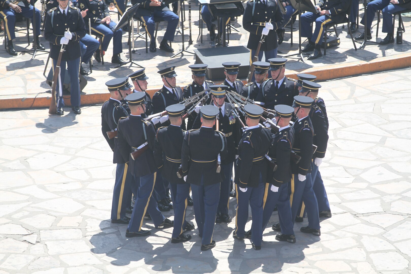 With amazing displays of discipline through unified movement in formation and catches of bayonet-tipped 1903 Springfield Rifles, the U.S. Army Drill Team performs a drill exhibition April 24 during Army Day at the Alamo in front of hundreds of onlookers. The Soldiers are assigned to 3rd U.S. Infantry Regiment “The Old Guard” at Fort Myer, Va.