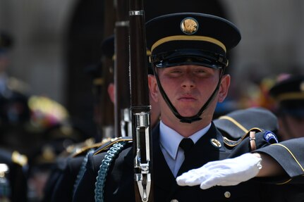Through unified movement in formation and catches of bayonet-tipped 1903 Springfield Rifles, the U.S. Army Drill Team performs a drill exhibition April 24 during Army Day at the Alamo in front of hundreds of onlookers.