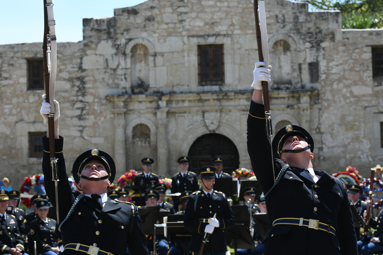 Through unified movement in formation and catches of bayonet-tipped 1903 Springfield Rifles, the U.S. Army Drill Team performs a drill exhibition April 24 during Army Day at the Alamo in front of hundreds of onlookers.