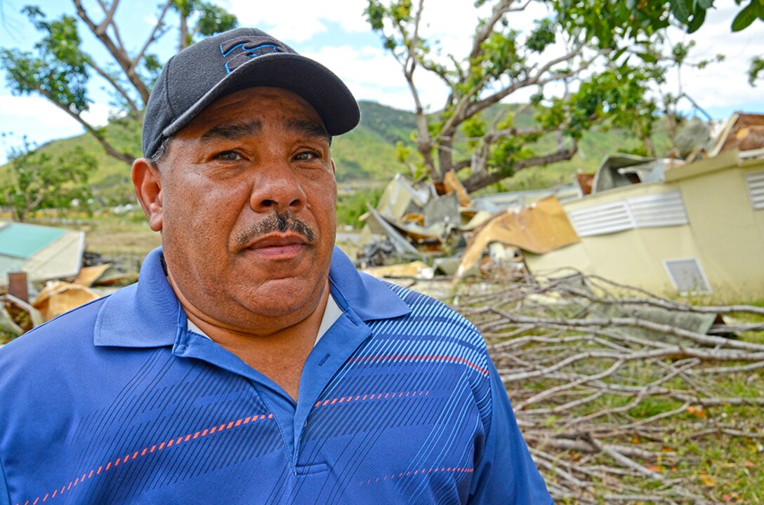 Luis Pena serves as the lone full-time civil servant for the Defense Logistics Agency in Puerto Rico. He helps military units shed their excess and used equipment and gets rid of their scrap metal. Here, he evaluates the pending scrap removal demands at Camp Santiago, which was one of the island's military installations hardest hit by Hurricane Maria in 2017.