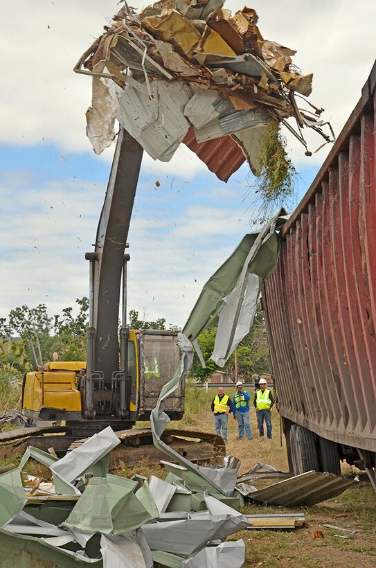DLA Disposition Services contract workers remove post-hurricane scrap from Camp Santiago in Puerto Rico in February, 2018. Camp Santiago was one of the hardest hit military installations on the island.