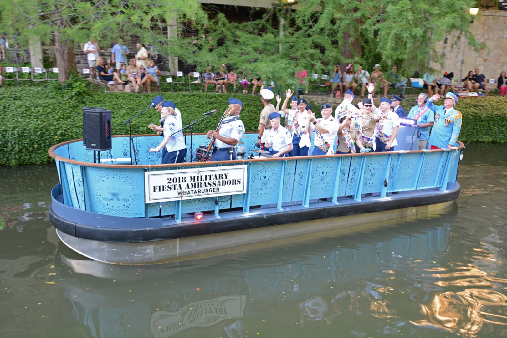 Military representatives from throughout San Antonio took part in the Texas Cavalier River Parade. The parade is one of the key events during Fiesta San Antonio and dates back to 1941. It runs along the River Walk in downtown San Antonio.
