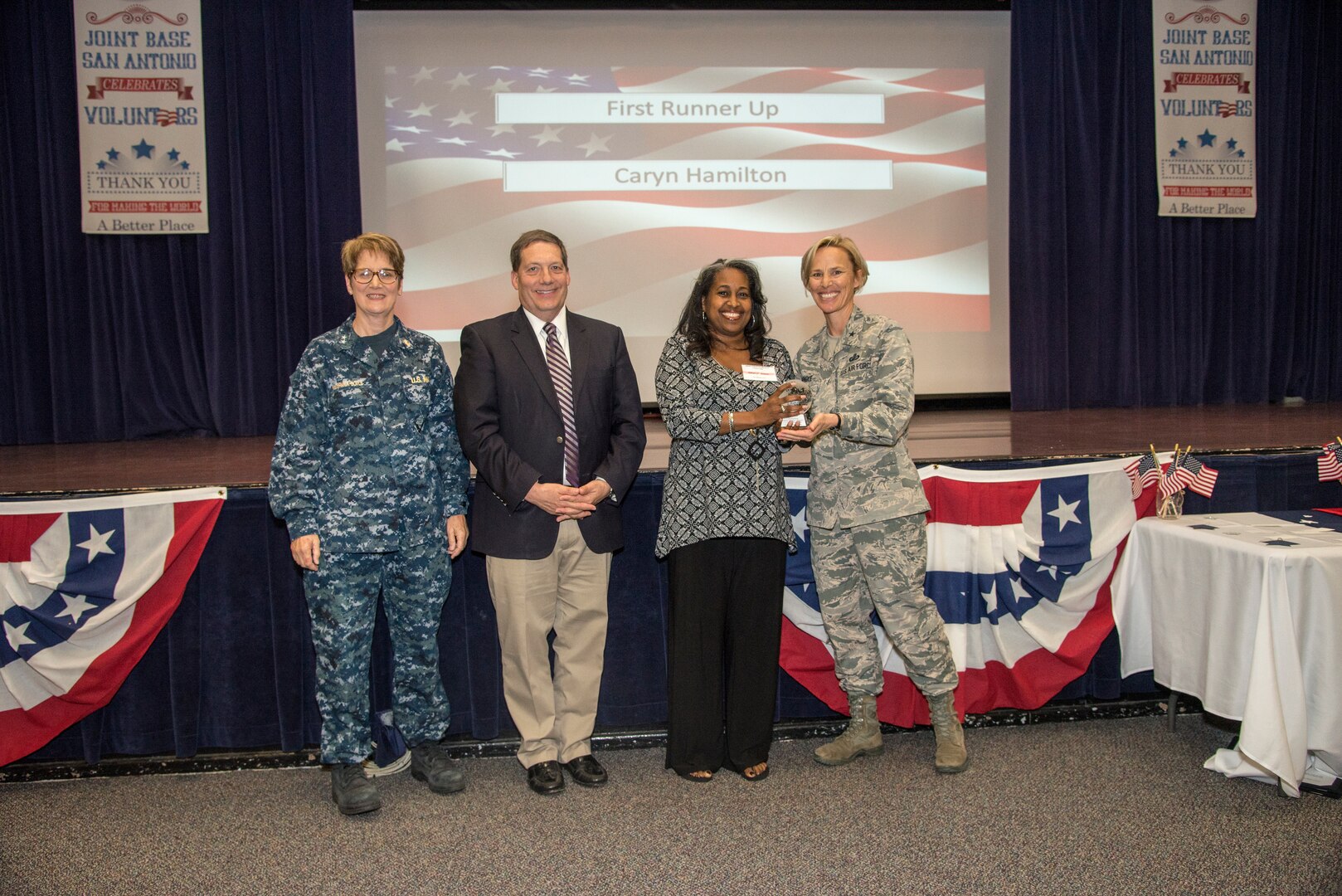 Celebrating the dedicated service of individuals and groups who have devoted their time helping members of the military community and remembering a beloved volunteer, Joint Base San Antonio held its annual Volunteer of the Year Awards Ceremony at the JBSA-Fort Sam Houston Military & Family Readiness Center April 18.