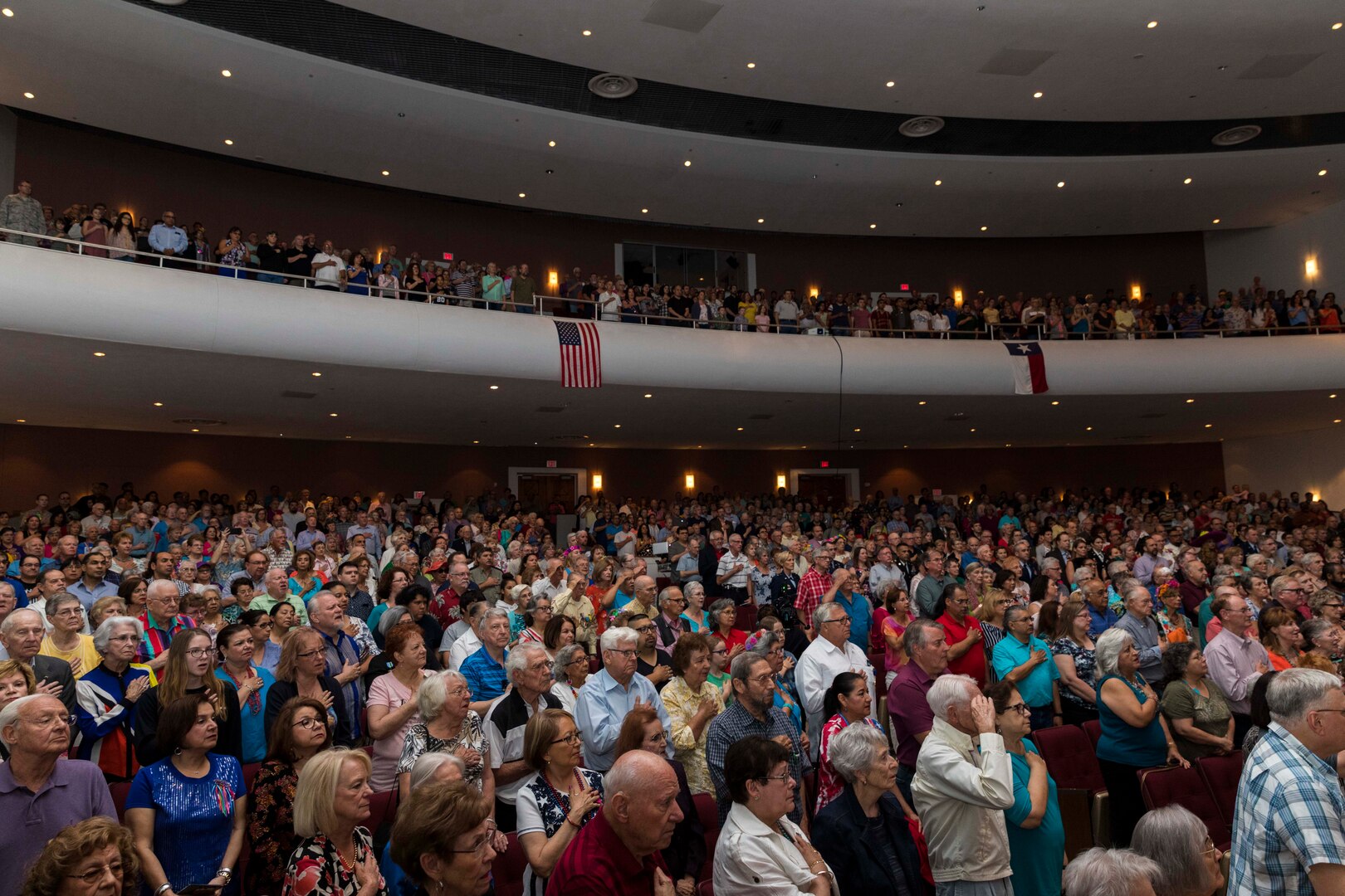 Civilians attend the Band of the West’s performance as part of Fiesta in Blue San Antonio, Texas April 24, 2018. The act was dedicated to the 300th Anniversary of San Antonio and honors the city's military heritage. Since 1891, Fiesta has grown into an annual celebration that includes civic and military observances, exhibits, sports, music and food representing the spirit, diversity and vitality of San Antonio. (U.S. Air Force photo by Ismael Ortega / Released)
