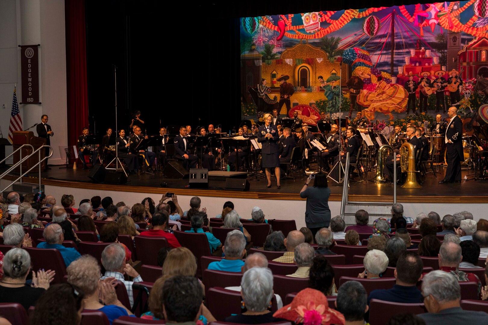 Brig. Gen. Heather L. Pringle (Center), 502nd Air Base Wing and Joint Base San Antonio commander, addresses the crowd prior the Band of the West performance in San Antonio,Texas April 24, 2018. The act was dedicated to the 300th Anniversary of San Antonio and honors the city's military heritage. Since 1891, Fiesta has grown into an annual celebration that includes civic and military observances, exhibits, sports, music and food representing the spirit, diversity and vitality of San Antonio. (U.S. Air Force photo by Ismael Ortega / Released)