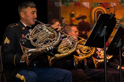 The 323d Army Band “Fort Sam’s Own” performs with the Band of the West as part of Fiesta in Blue in San Antonio, Texas April 24, 2018. The act was dedicated to the 300th Anniversary of San Antonio and honors the city's military heritage. Since 1891, Fiesta has grown into an annual celebration that includes civic and military observances, exhibits, sports, music and food representing the spirit, diversity and vitality of San Antonio. (U.S. Air Force photo by Ismael Ortega / Released)
