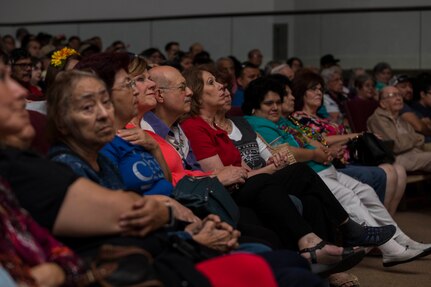 Civilians attend the Band of the West’s performance as part of Fiesta in Blue San Antonio, Texas April 24, 2018. The act was dedicated to the 300th Anniversary of San Antonio and honors the city's military heritage. Since 1891, Fiesta has grown into an annual celebration that includes civic and military observances, exhibits, sports, music and food representing the spirit, diversity and vitality of San Antonio. (U.S. Air Force photo by Ismael Ortega / Released)