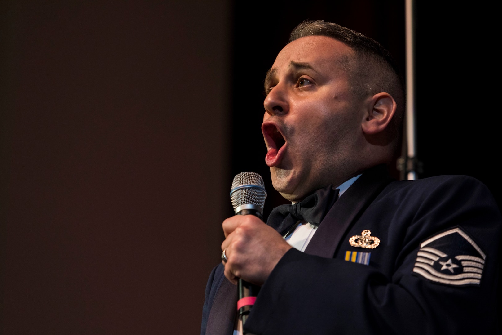 Tenor vocalist Master Sgt. Joseph Haughton with the Singing Sergeants, U.S. Air Force Band, Joint Base Anacostia-Bolling, Washington, D.C. performs as part of Fiesta in Blue in San Antonio, Texas April 24, 2018. The act was dedicated to the 300th Anniversary of San Antonio and honors the city's military heritage. Since 1891, Fiesta has grown into an annual celebration that includes civic and military observances, exhibits, sports, music and food representing the spirit, diversity and vitality of San Antonio. (U.S. Air Force photo by Ismael Ortega / Released)