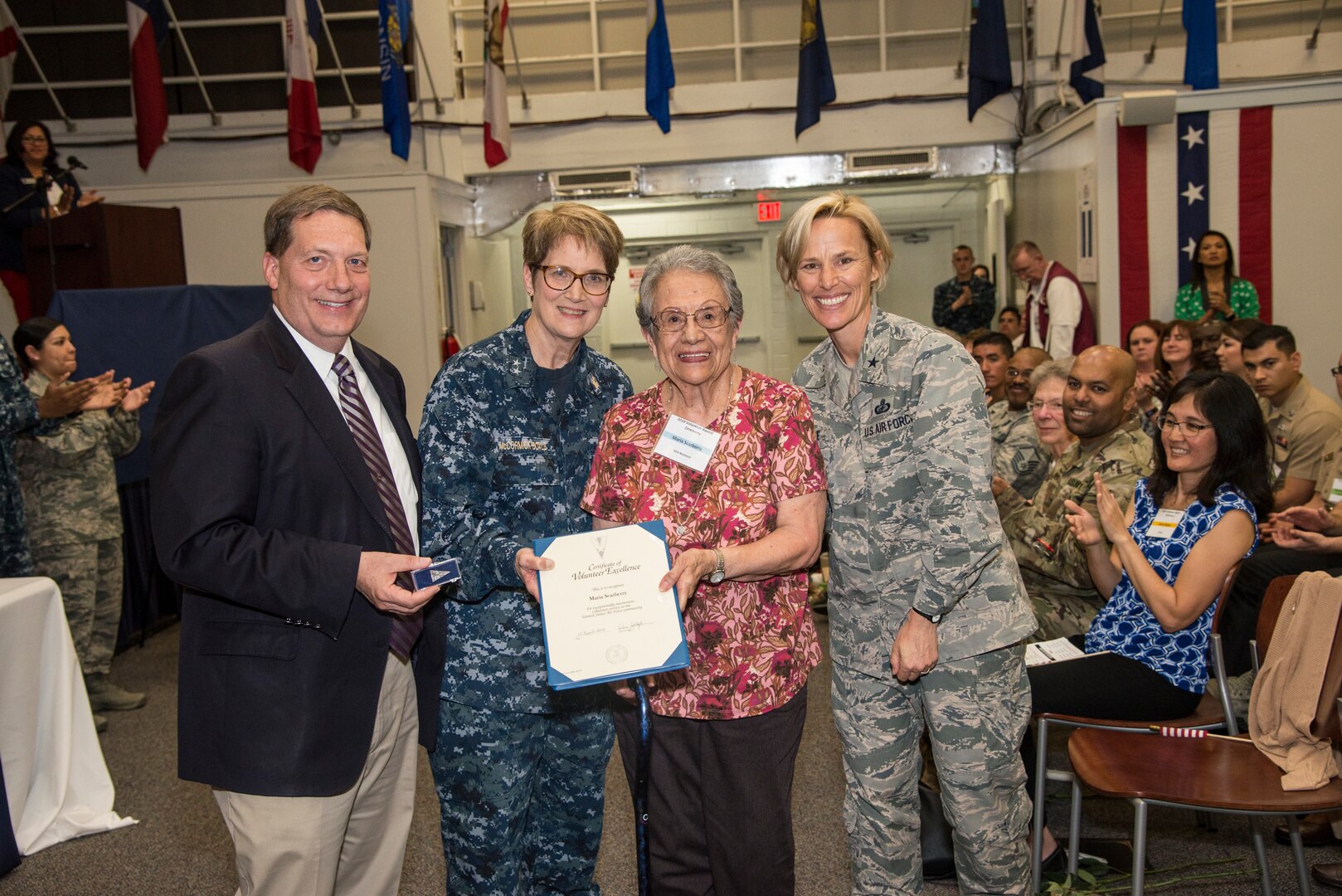 Celebrating the dedicated service of individuals and groups who have devoted their time helping members of the military community and remembering a beloved volunteer, Joint Base San Antonio held its annual Volunteer of the Year Awards Ceremony at the JBSA-Fort Sam Houston Military & Family Readiness Center April 18.