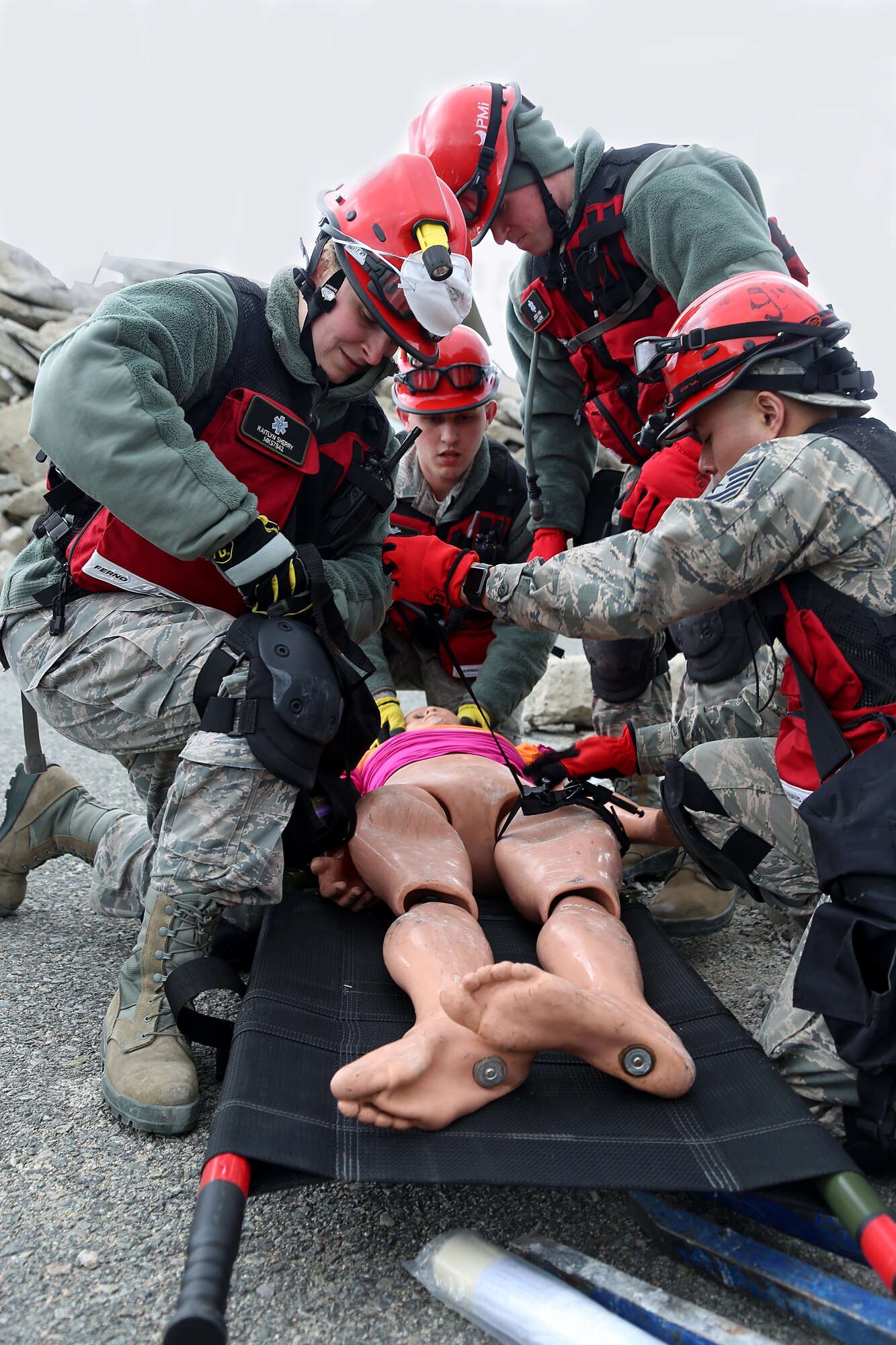 Search and Extraction medics, assigned to the 157th Medical Group, N.H. Air National Guard,  provide life-saving care to a simulated casualty on April 11, 2018 at Joint Base Cape Cod, Mass. The medics participated in a week-long deployment readiness exercise as part of the New England CBRNE Enhanced Response Force Package (CERFP). (N.H. Air National Guard photo by Staff Sgt. Kayla White)