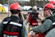 Tech. Sgt. Matthew T. Prugger, a flight operations medical technician assigned to the 157th Medical Group, N.H. Air National Guard, directs members of the medical search and extraction team through the decontamination tents during a simulated exercise on April 11, 2018 at Joint Base Cape Cod, Mass. The medics participated in a joint deployment readiness exercise as part of the New England CBRNE Enhanced Response Force Package team. (N.H. Air National Guard photo by Staff Sgt. Kayla White)