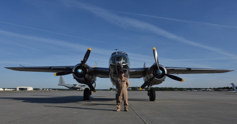 Roger Van Ranst, flight mechanic for the B-25J “Miss Mitchell,” stands in front of the plane April 26, 2018, on the flightline of Atlantic Aviation.