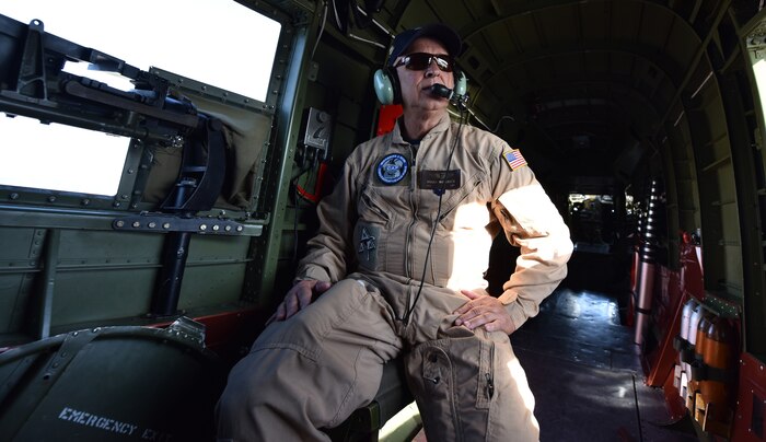 Roger Van Ranst, flight mechanic for B-25J “Miss Mitchell,” sits in the back of the plane during a flight over Charleston, S.C., April 26, 2018.