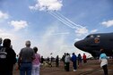 The 454th Bombardment Wing reunion group gather around a B-52 Stratofortress static display during a missing man formation in honor of Maj. Stephen Del Bagno, U.S. Air Force Air Demonstration Squadron Slot Pilot Thunderbird 4, April 21, 2018, on Columbus Air Force Base, Mississippi, at the 2018 Wings Over Columbus Open House and Air and Space Show. (U.S Air Force photo by Airman 1st Class Keith Holcomb)