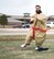 Jacob Garrett, an education liaison at the Airmen and Family Readiness Center, runs a lap in a sumo suit at Ellsworth Air Force Base, S.D., April 20, 2018. One of the key events of Sexual Assault Awareness and Prevention Month was the Sexual Assault Prevention and Response race that six team’s participated in. (U.S. Air Force photo by Airman 1st Class Thomas Karol)