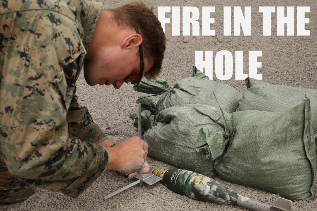 Sgt. Christopher Piette, an explosive ordinance disposal technician with EOD Company, 9th Engineer Support Battalion, Combat Logistics Regiment 35, measures a 81mm mortar round for disabling and disposal during post-blast analysis and render safe procedure training April 25, 2018 at Camp Hansen, Okinawa, Japan. Marines with EOD Company, 9th ESB and Air Force EOD technicians with EOD Unit, 18th Civil Engineers conducted the training to instruct junior technicians on safe disposal of ordnance and examination of ordinance blast craters to determine potential locations for hostile enemy positions. Piette is a native of Green Bay, Wisconsin. (U.S. Marine Corps photo by Sgt. Tiffany Edwards)