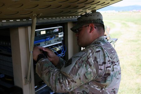 Soldier in the field fixing STT