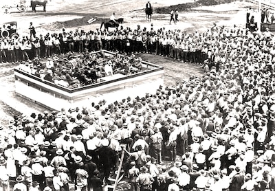 The May 4, 1918, dedication of the Columbus Quartermaster Reserve Depot. More than 3,000 workers built six buildings and a barracks in the first three months. Eventually the facility held nearly 800,000 square feet of warehouse space for World War I supplies.